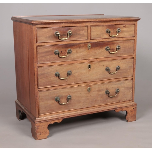 170 - A Georgian mahogany chest of two over three drawers raised on ogee bracket feet. Height 81cm, Width ... 