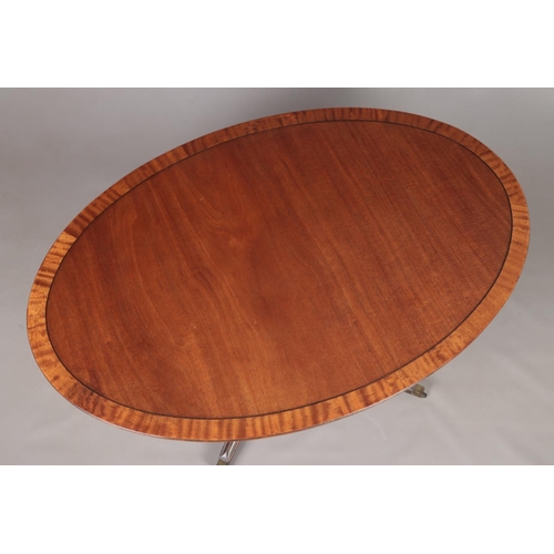 177 - A Regency mahogany tilt top dining table raised on centre pedestal with four splay supports. Label f... 