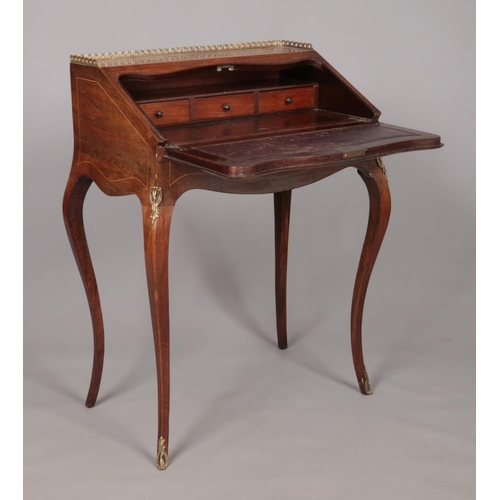 181 - An early 20th century rosewood writing desk with marquetry inlaid drop down front, fitted interior a... 