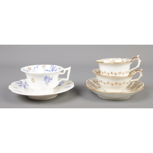 19 - A collection of Rockingham porcelain tea wares. Includes cup and saucer with red griffin mark along ... 