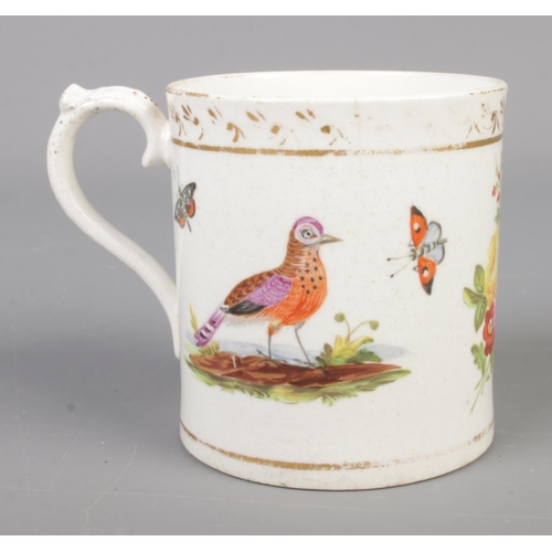 21 - A late 18th/early 19th century cup with gilt borders and hand painted bird and floral decoration. Po... 
