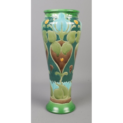 27 - A large Burmantofts Faience Art Nouveau vase. Impressed with makers mark and 2412 to base. Height 37... 