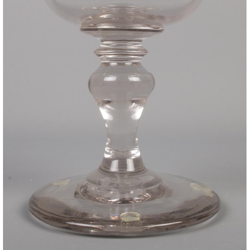 42 - A large 19th century glass rummer with knopped capstan stem. Height 22.5cm.