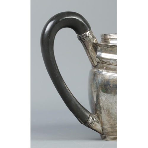 57 - A George III silver teapot with ebonised handle and finial. Assayed London 1800 by George Burrows (I... 