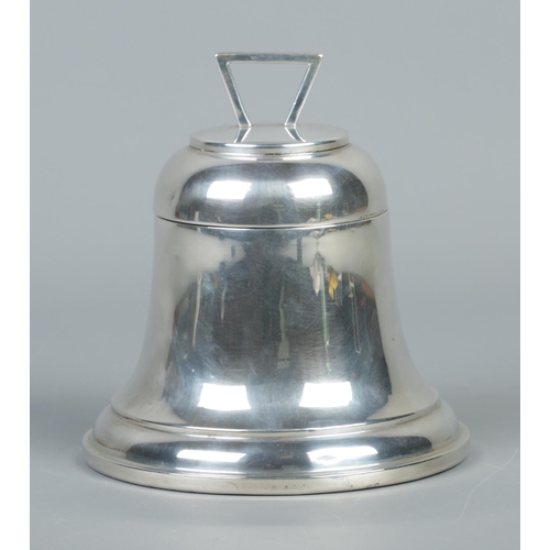 58 - A silver bell shaped ink well with hinged cover and glass liner. Assayed Birmingham 1936. Height 12c... 