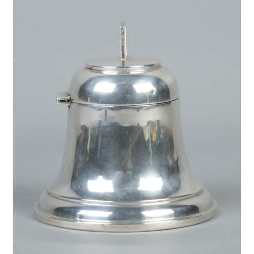 58 - A silver bell shaped ink well with hinged cover and glass liner. Assayed Birmingham 1936. Height 12c... 