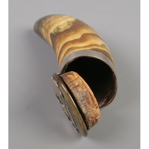 70 - An early 19th century Scottish horn snuff mull with hinged cover and white metal mounts depicting a ... 