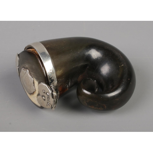 73 - A small early 19th century Scottish horn snuff mull with hinged cover and white metal mounts. 7cm x ... 