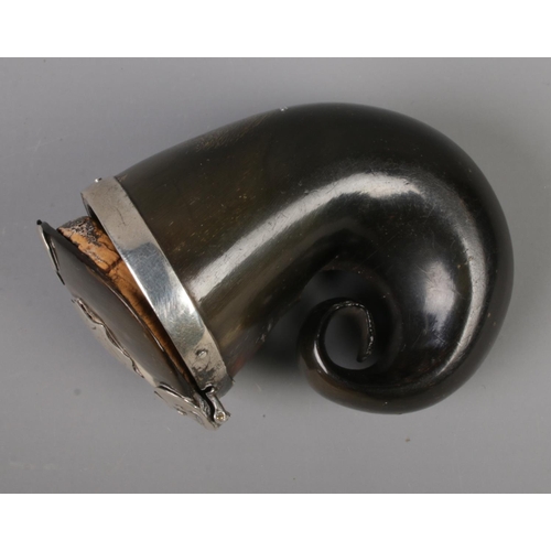 73 - A small early 19th century Scottish horn snuff mull with hinged cover and white metal mounts. 7cm x ... 