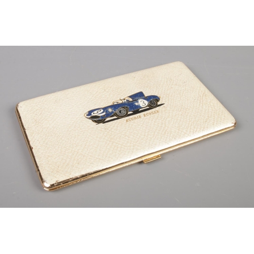 75 - A vintage cigarette case embossed with 1957 Le Mans winning No.3 D-type Jaguar and Ecurie Ecosse in ... 