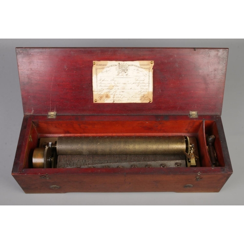 86 - A 19th century cylinder music box by D Lecoultre. With winding key.