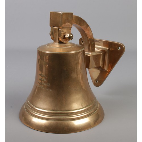 65 - A bronze ship's bell inscribed Metal From HMS Tiger, Jutland 1916. Height 21cm, Diameter of bell bas... 