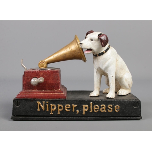 194 - A cast iron musical figure formed as the His Master's Voice dog and gramophone with moving jaw and e... 