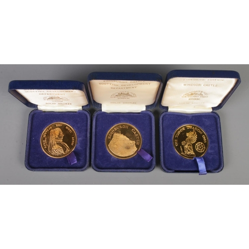 207 - The Tower Mint; Three solid bronze medallions depicting Windsor Castle, Edinburgh Castle and Mary Qu... 