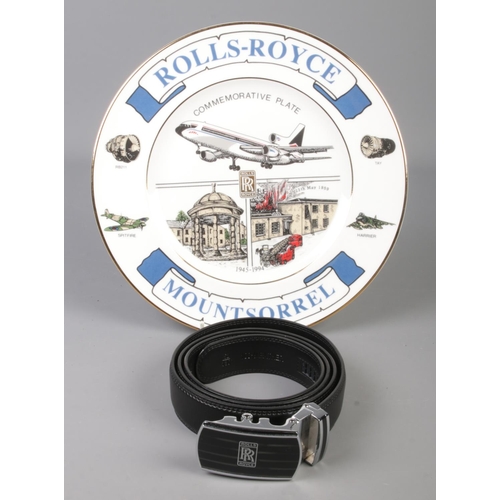 214 - A Rolls Royce commemorative plate along with a leather belt with Rolls Royce buckle.