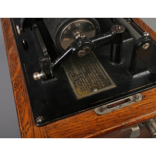 217 - An Edison Standard Phonograph with original oak case. Serial Number 468949.