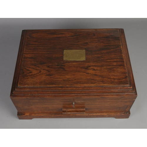 252 - An oak presentation case, with self-locking lower drawer, containing an assortment of boxed radio va... 