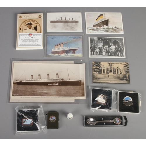 262 - A quantity of Titanic & Olympic ephemera. Includes post cards, photographs, badges, etc.