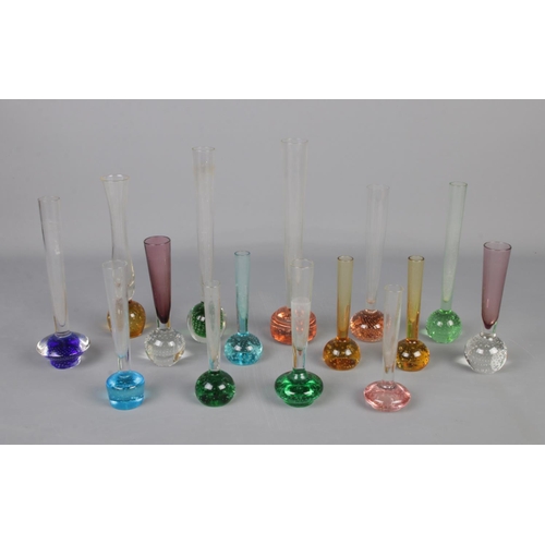 282 - A collection of 15 controlled bubble bud vases in various colours and sizes.