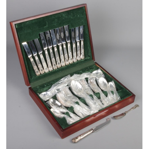 299 - A complete canteen of J.B. Fowler kings pattern cutlery.