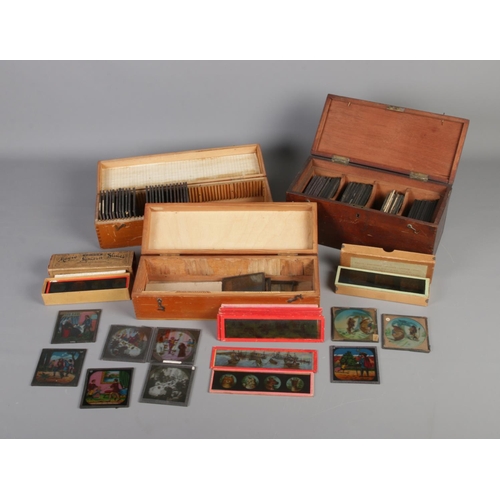 339 - Three cases of coloured magic lantern slides including several sets such as The Transvaal War and Je... 