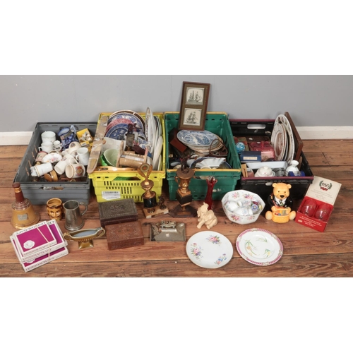 340 - Four boxes of miscellaneous. Includes Rington's ceramic teddy bear barrel, cabinet plates, trophies,... 