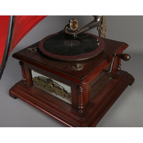 410 - A concert hall gramophone featuring painted tinplate horn and Gramola soundbox. Possible reproductio... 