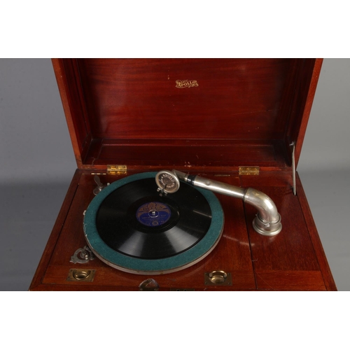 411 - An Apollo oak cased hornless gramophone.