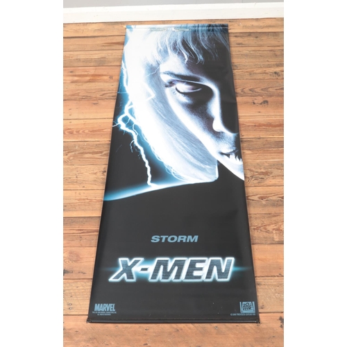 445 - An X-Men Storm vinyl banner poster, dated 2000. Approx. dimensions 61cm x 180cm.