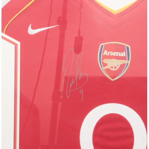 457 - A signed Jose Antonio Reyes Arsenal football shirt mounted in display frame. Approx. frame dimension... 