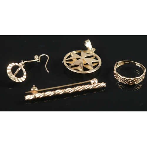 482 - Four pieces of 9ct gold jewellery. Includes rope twist bar brooch, star pendant, ring and one drople... 