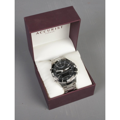 512 - A men's Accurist analogue/digital quarts wristwatch with original box and extra links.