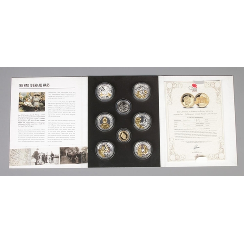 555 - A London Mint Office 'We Will Remember Them' coin set. In Flanders Field Museum.