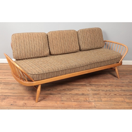 584 - Lucian Ercolani for Ercol, a vintage sofa/day bed with 'Surfboard' back. Length 210cm.