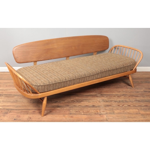 584 - Lucian Ercolani for Ercol, a vintage sofa/day bed with 'Surfboard' back. Length 210cm.