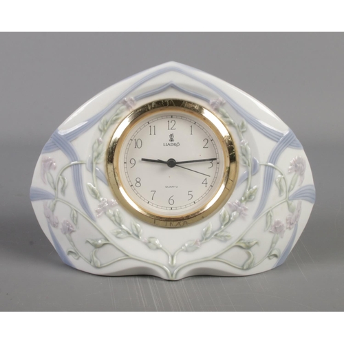 237 - A quartz Lladro mantle clock.