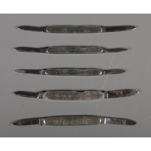 243 - A collection of 5 advertising penknives to include Evening News, Yorkshire Evening Post, WM.Sanderso... 