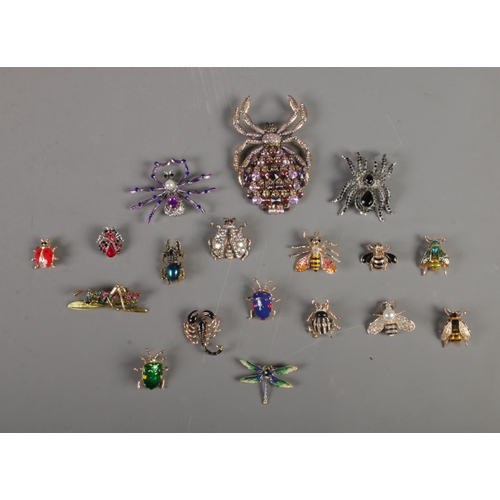 246 - A collection of insect and spider brooches