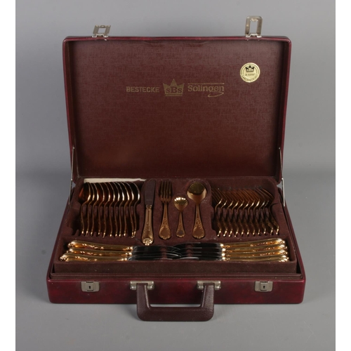 247 - Cased Bestecke Solingen gold plated cutlery canteen