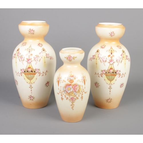 288 - Set of three Crown Devon vases.