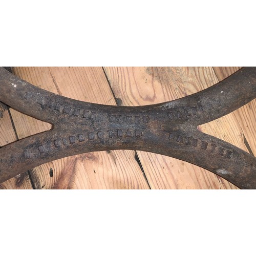 421 - A pair of 19th century cast iron bench supports. Marked for T Larmuth, Sidebotham Patentee.