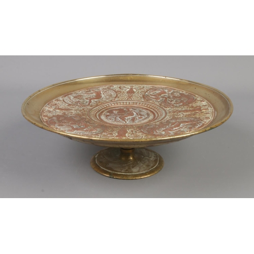 4 - A late 19th century brass and copper tazza. With central panel depicting Temperantia, surrounded by ... 