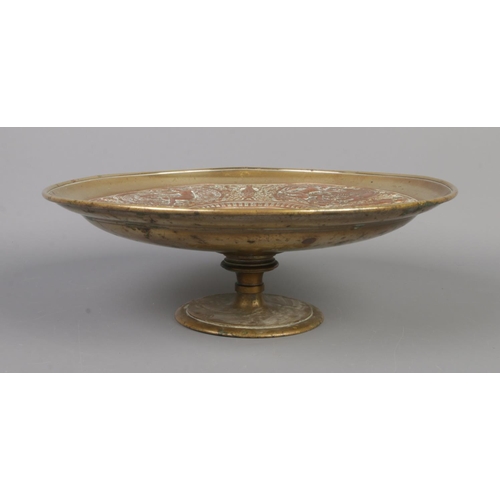 4 - A late 19th century brass and copper tazza. With central panel depicting Temperantia, surrounded by ... 