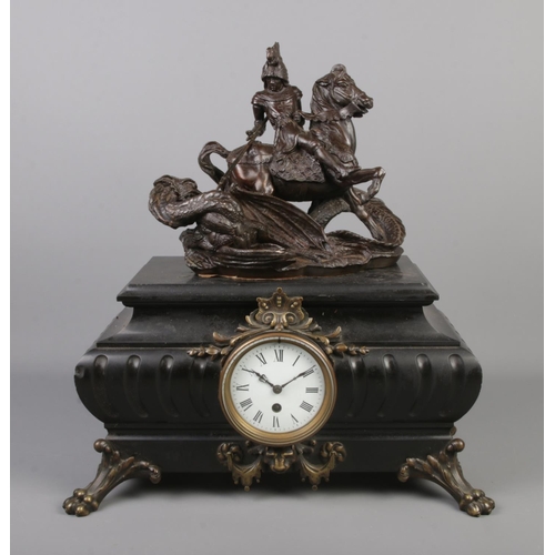 1 - A large mantel clock surmounted with a bronze sculpture depicting St George and the dragon and raise... 