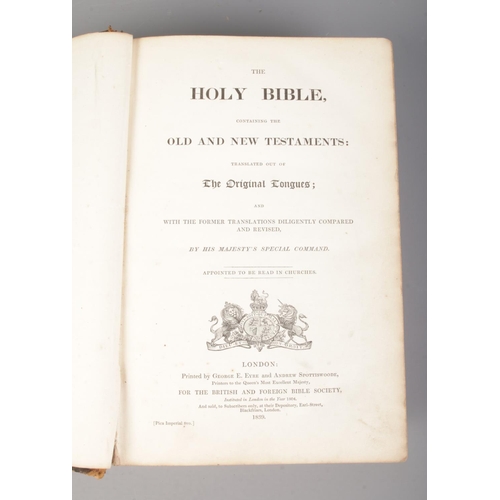 560 - Two Victorian leather bound bibles; one with marbled insert. Dated 1856 and 1839.