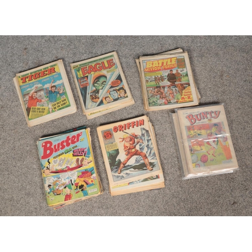 576 - A quantity of comic books including Eagle, Tiger, Bunty, Griffin, Battle Action Force and Buster. On... 