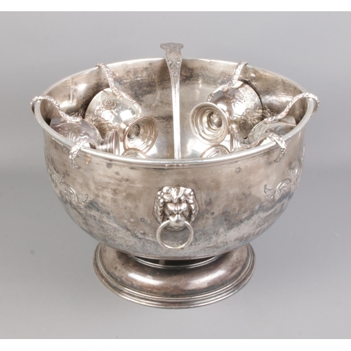 107 - Pinder Bros Ltd silver plate punch bowl, cups and ladle engraved 