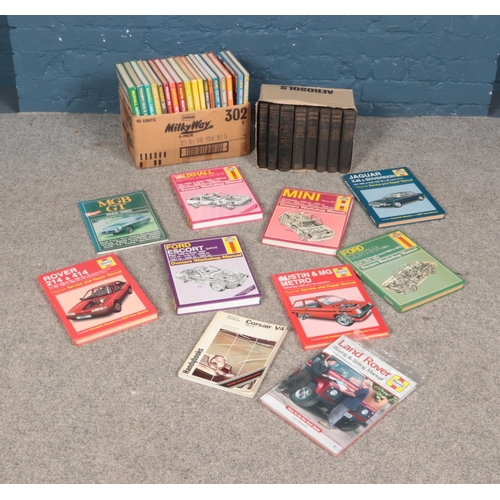 586 - Two boxes of automobile related annuals and books, including 