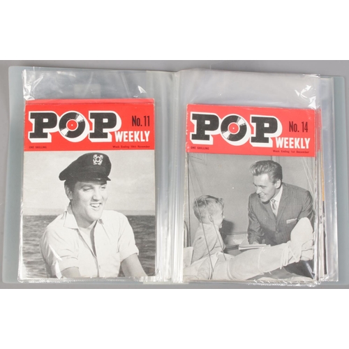 619 - A folder containing music magazines. Includes The Beatles Book Monthly No.1-7, approximately 30 Pop ... 