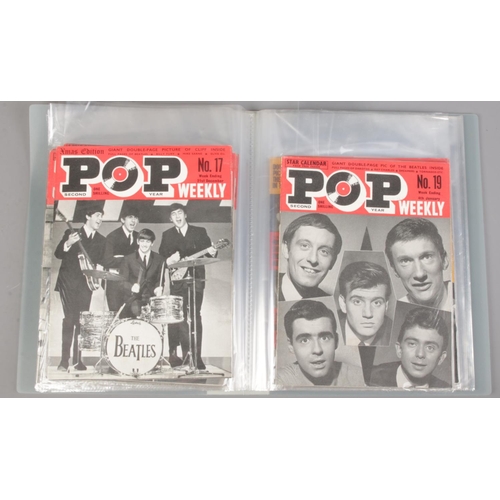 619 - A folder containing music magazines. Includes The Beatles Book Monthly No.1-7, approximately 30 Pop ... 